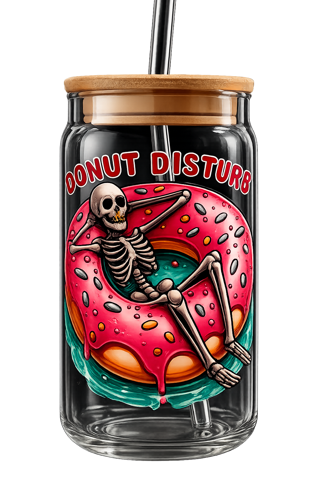 A clear glass tumbler with a bamboo lid and black straw, featuring a colorful graphic of a skeleton lounging inside a pink donut with the text 'DONUT DISTURB' in red outlined letters.